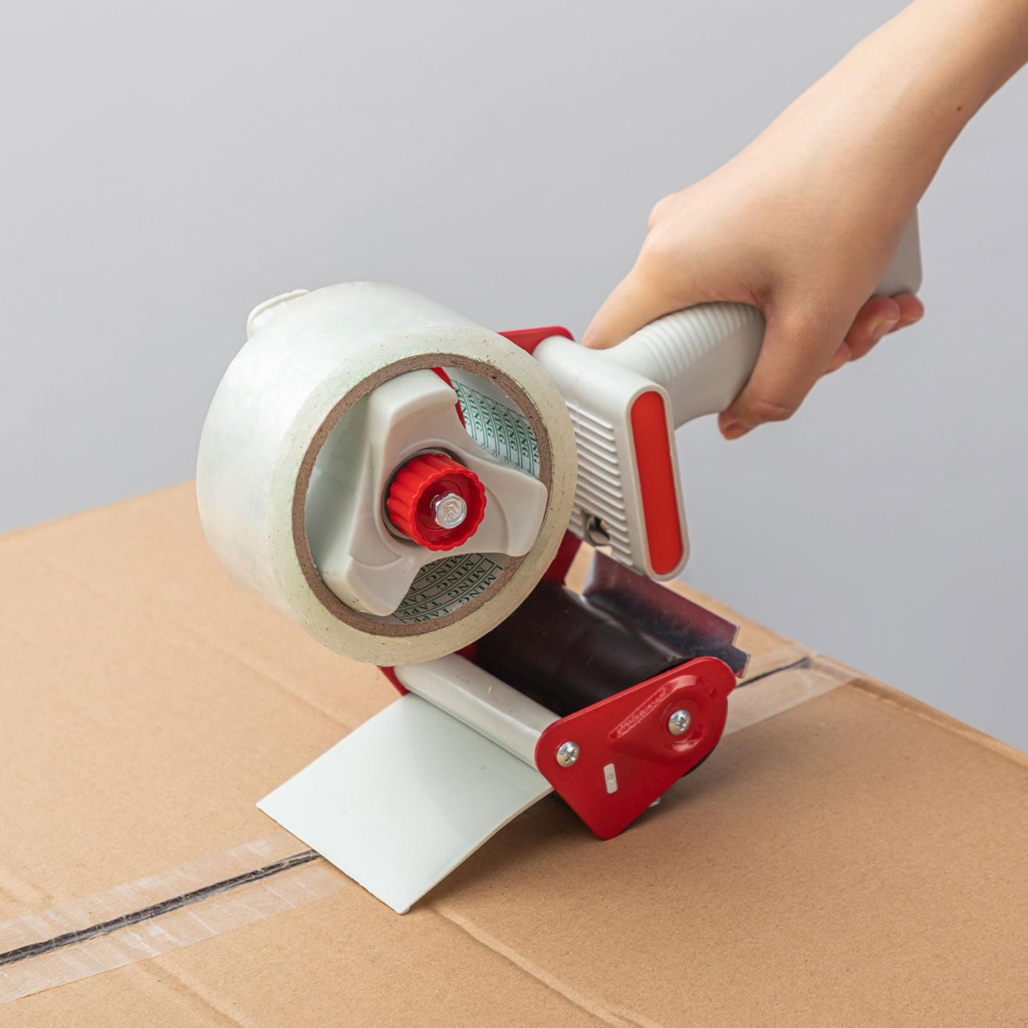 Packing Tape Gun Dispenser with 2 Rolls Parcel Tape – Clear & Buff (50mm)